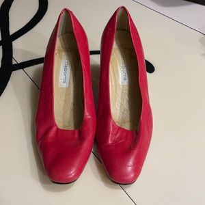 Thrifted red heel